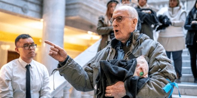 Actor James Cromwell Storms Utah Capitol Building Holding Dead Piglet In Animal Cruelty Protest