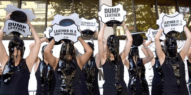 Activists pour ‘toxic slime’ over their heads to protest leather use at London Fashion Week